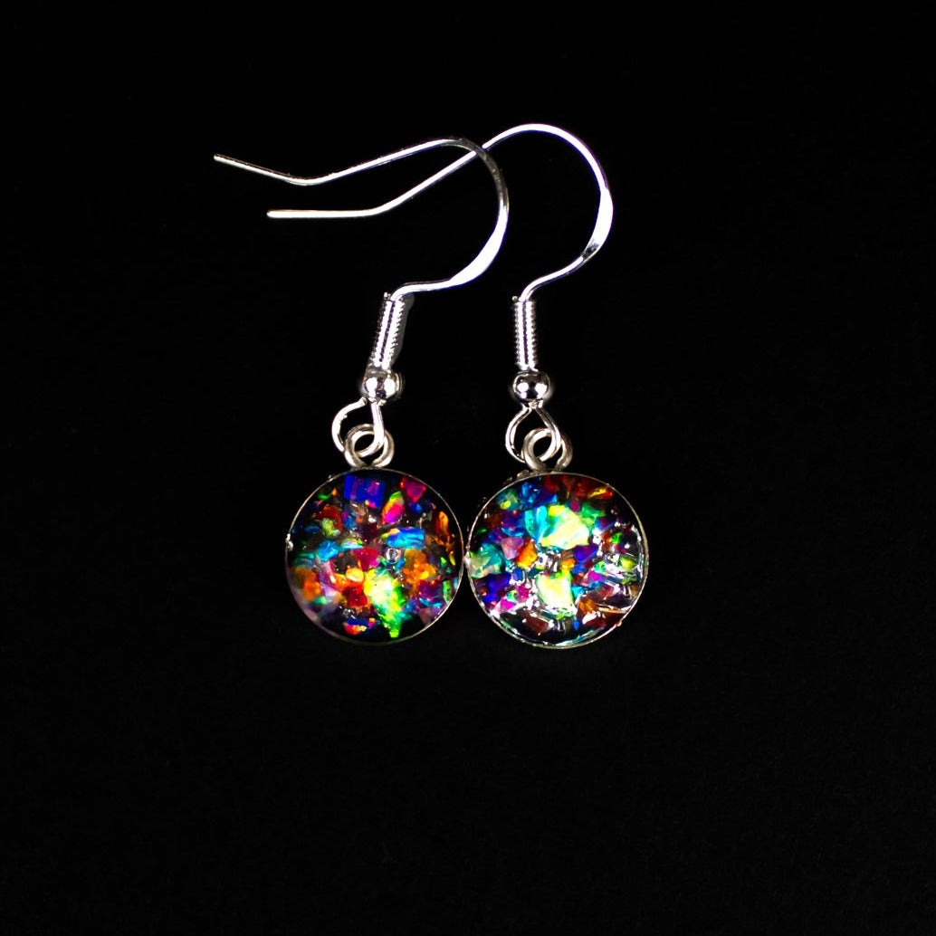Rainbow Dinosaur Dangle authentic silver dangle earrings with Campo Del Cielo meteorite, real dinosaur bone, and rainbow opal inlay in red, orange, blue, purple, green, and white