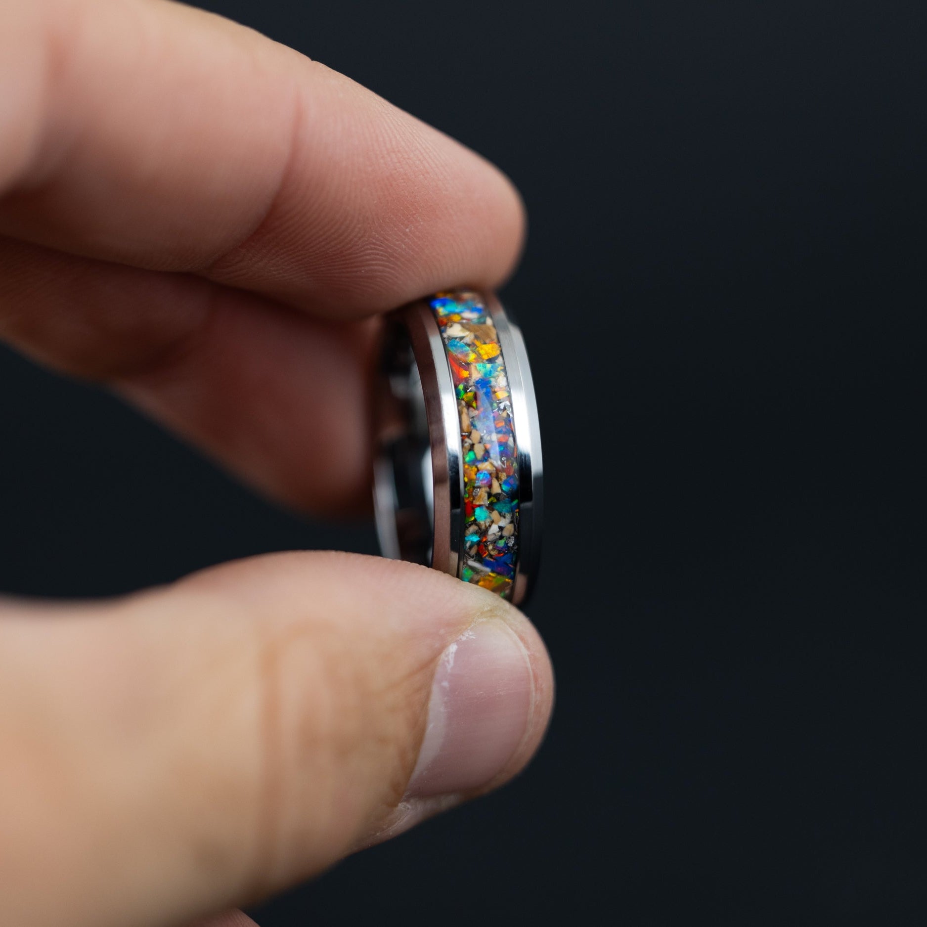 Handcrafted Campo del Cielo meteorite shavings and genuine fossilized mosasaur tooth ring.