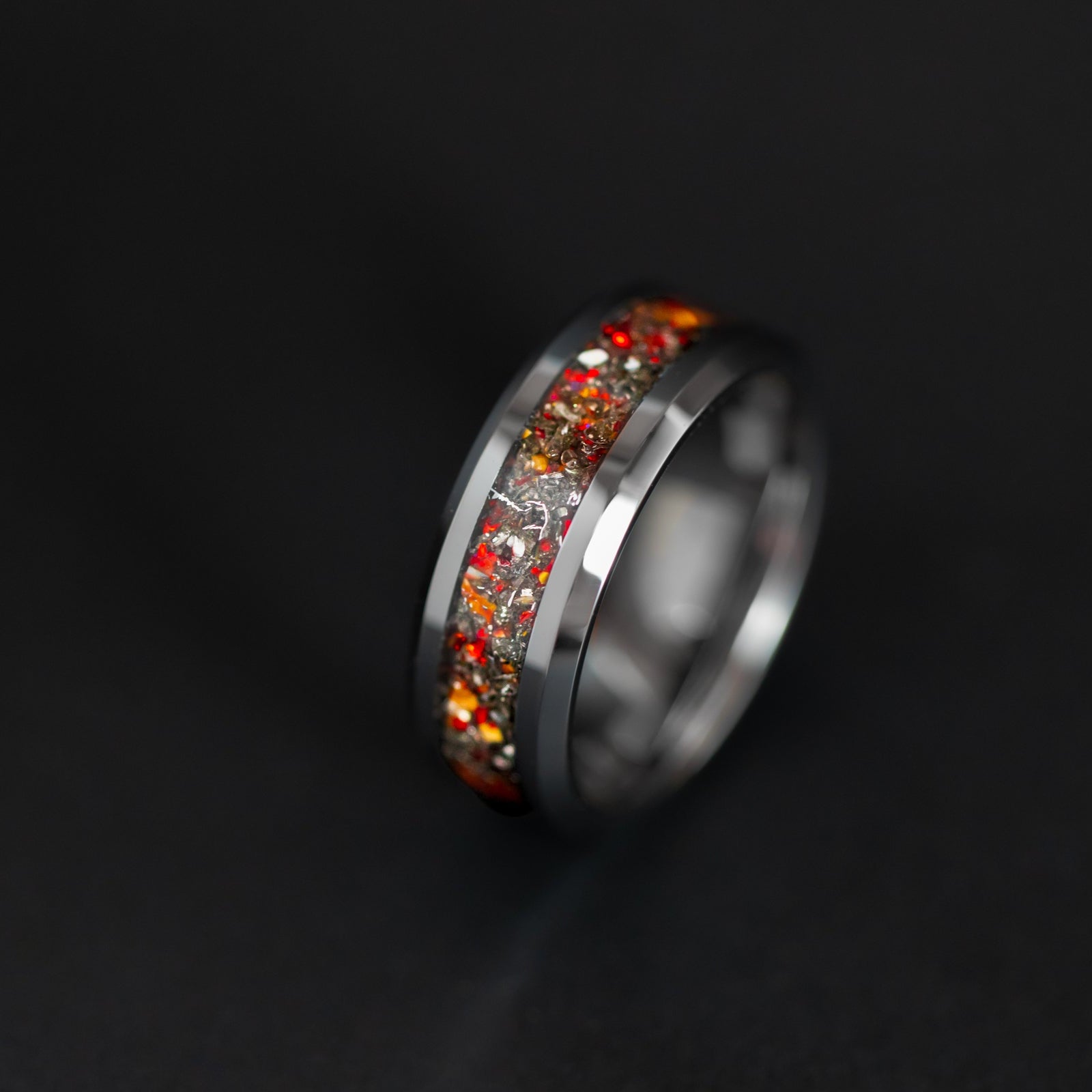8mm beveled tungsten ring with authentic Velociraptor bone and Campo del Cielo meteorite with red opal accents