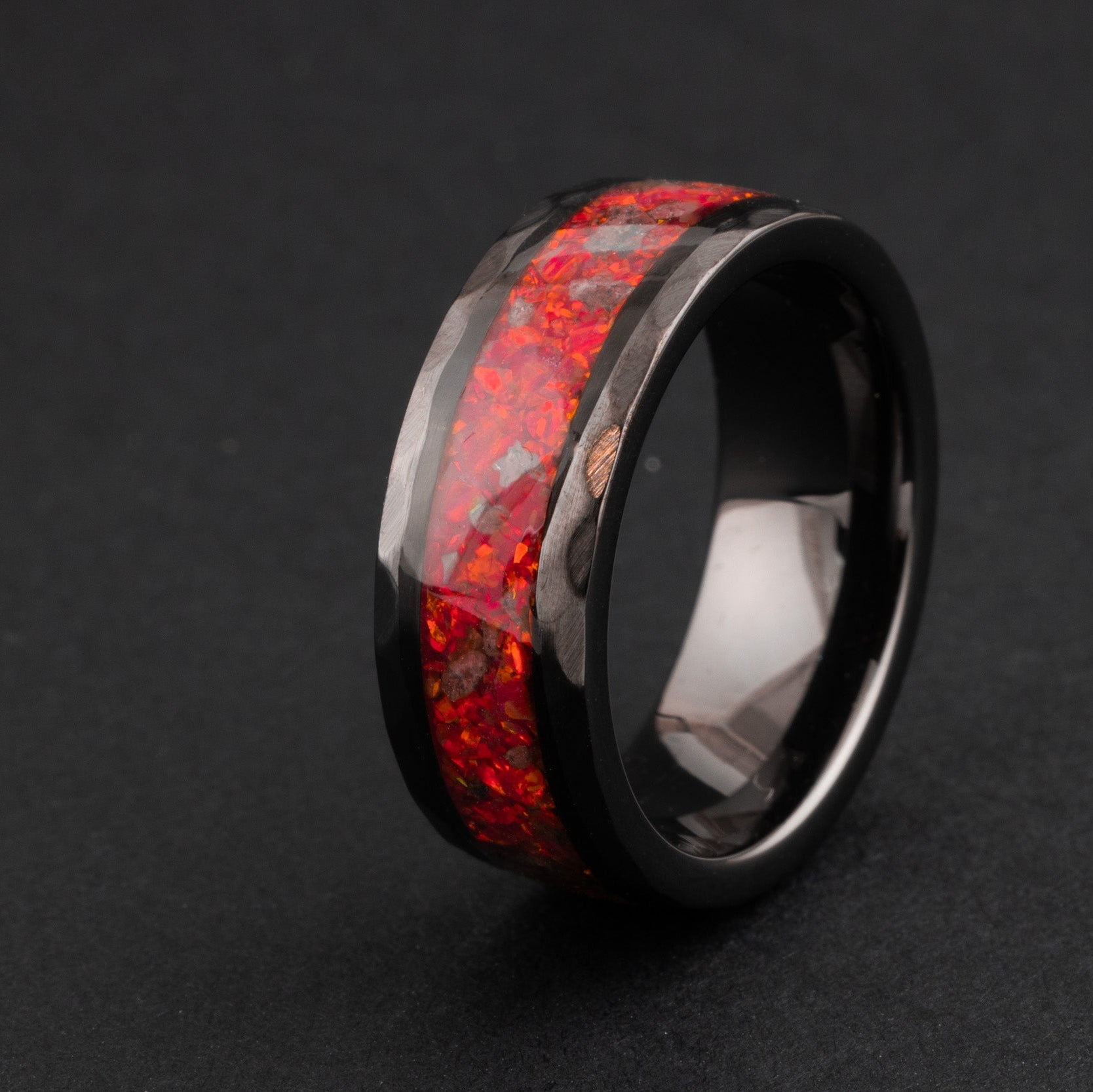 Authentic Martian meteorite and red fire opal ring in a hammered black ceramic band.