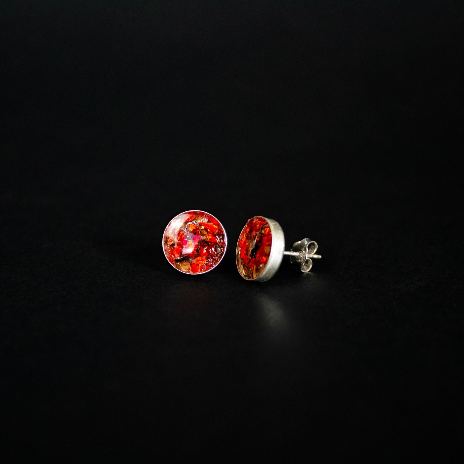 Ruby Red TRex authentic silver stud earrings with Campo Del Cielo meteorite, real T-Rex fossil bone, and vivid red opal inlay
