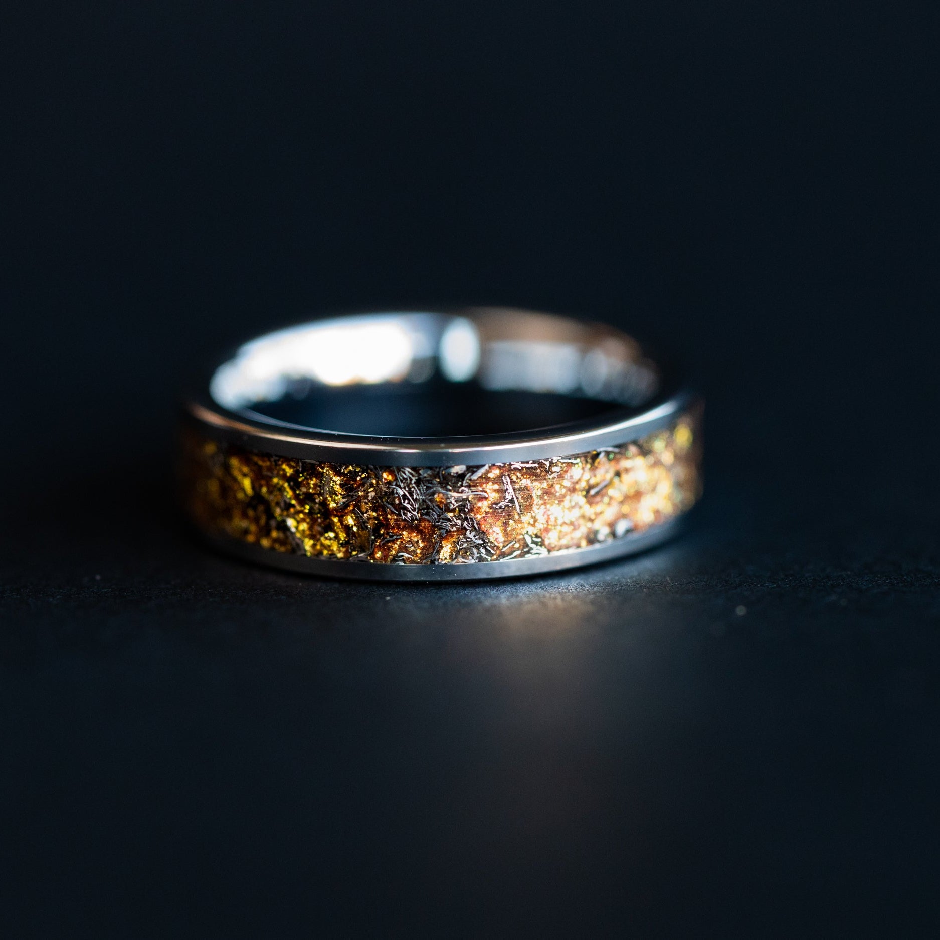 Handcrafted 6mm wide channel tungsten mens wedding band with authentic Campo del Cielo meteorite and gold galaxy pigment inlay made in California