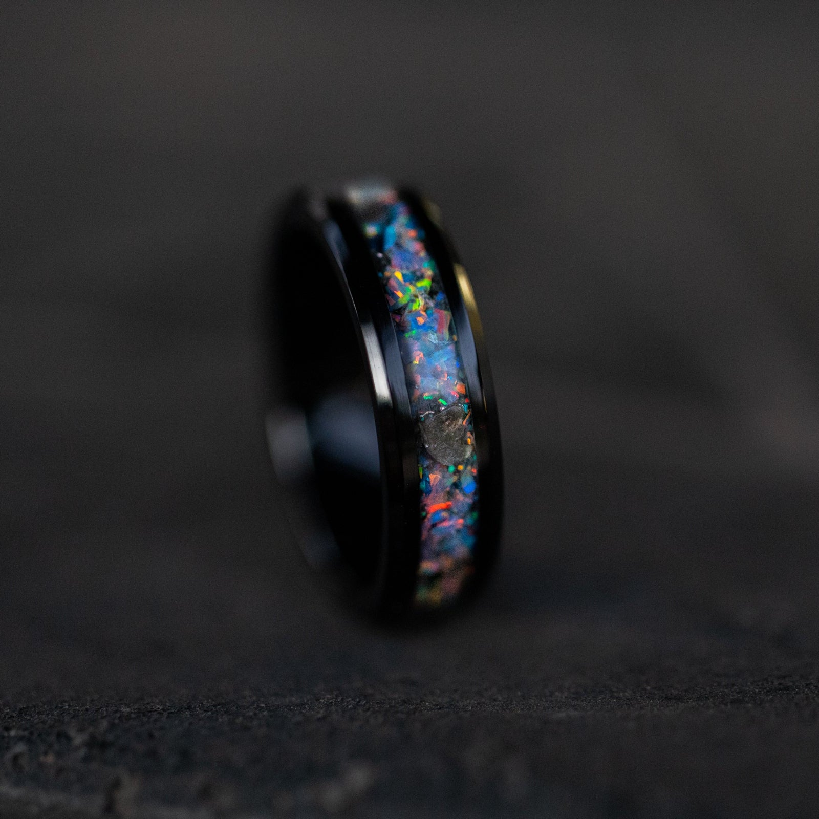 Handcrafted 6mm beveled black ceramic mens wedding band with authentic lunar meteorite and moonstone opal inlay made in California