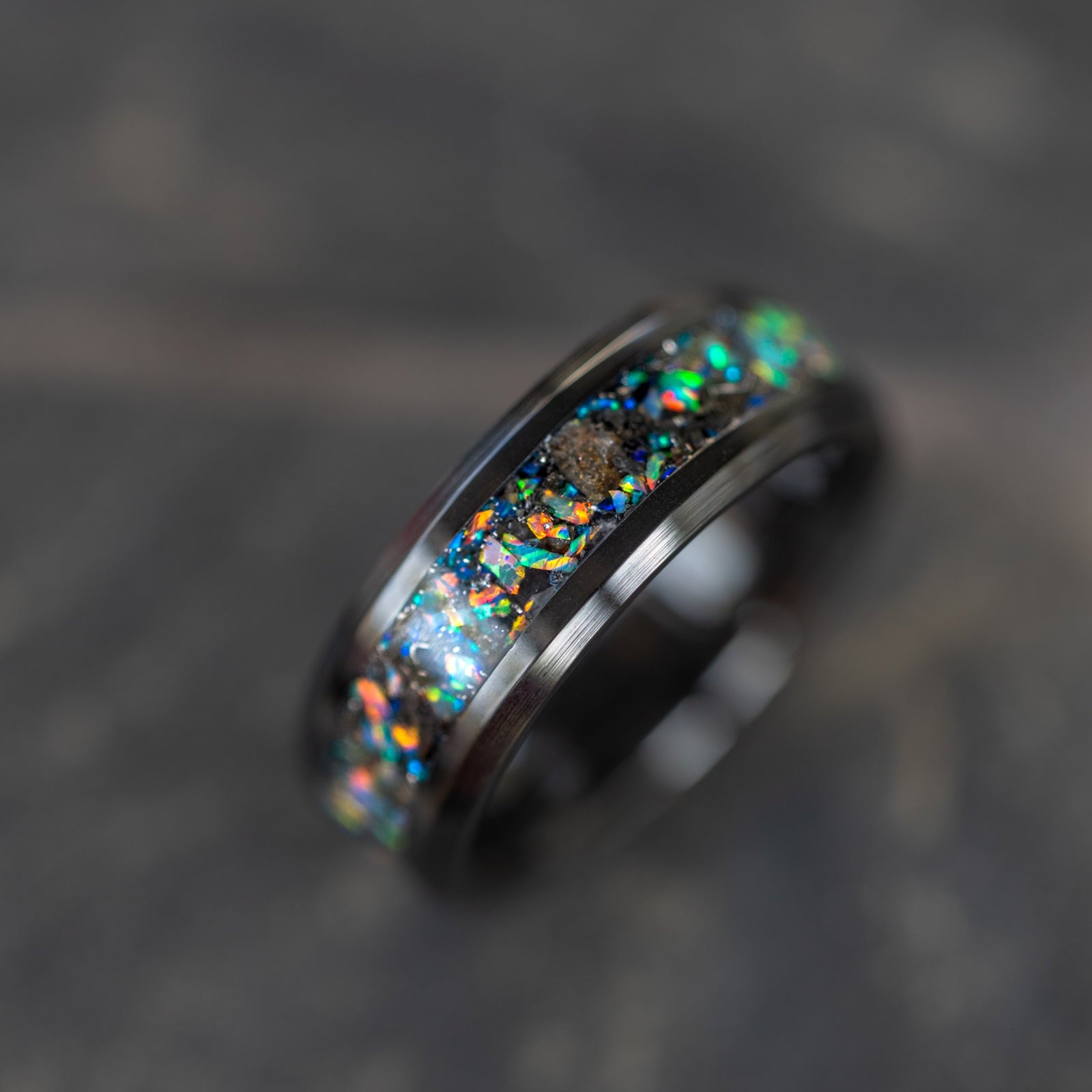 Handcrafted 8mm beveled black ceramic mens wedding band with authentic lunar meteorite and moonstone opal inlay made in California