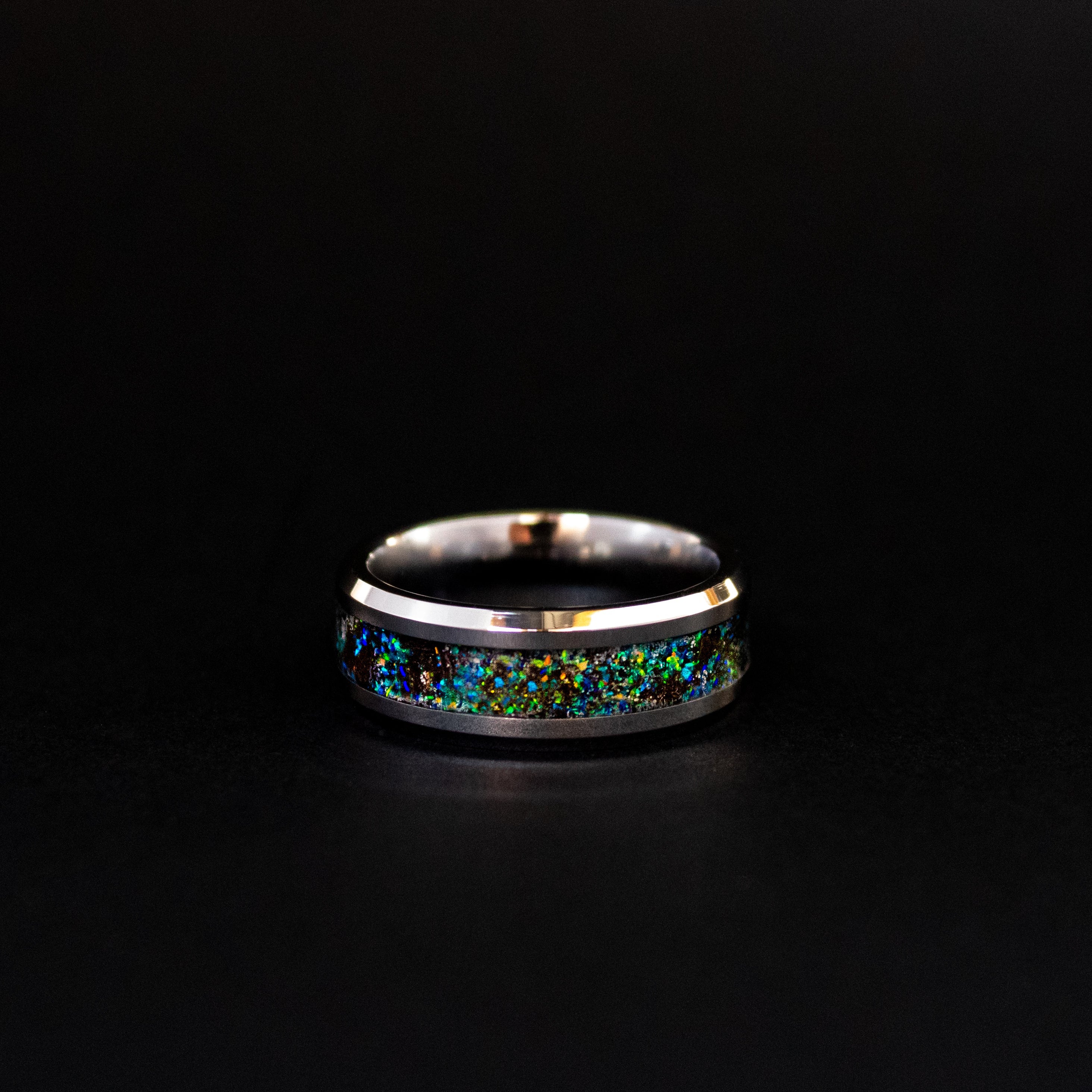 Handcrafted 8mm beveled tungsten mens wedding band with authentic Megalodon tooth and Campo del Cielo meteorite in blue and green opal iridescent inlay made in California