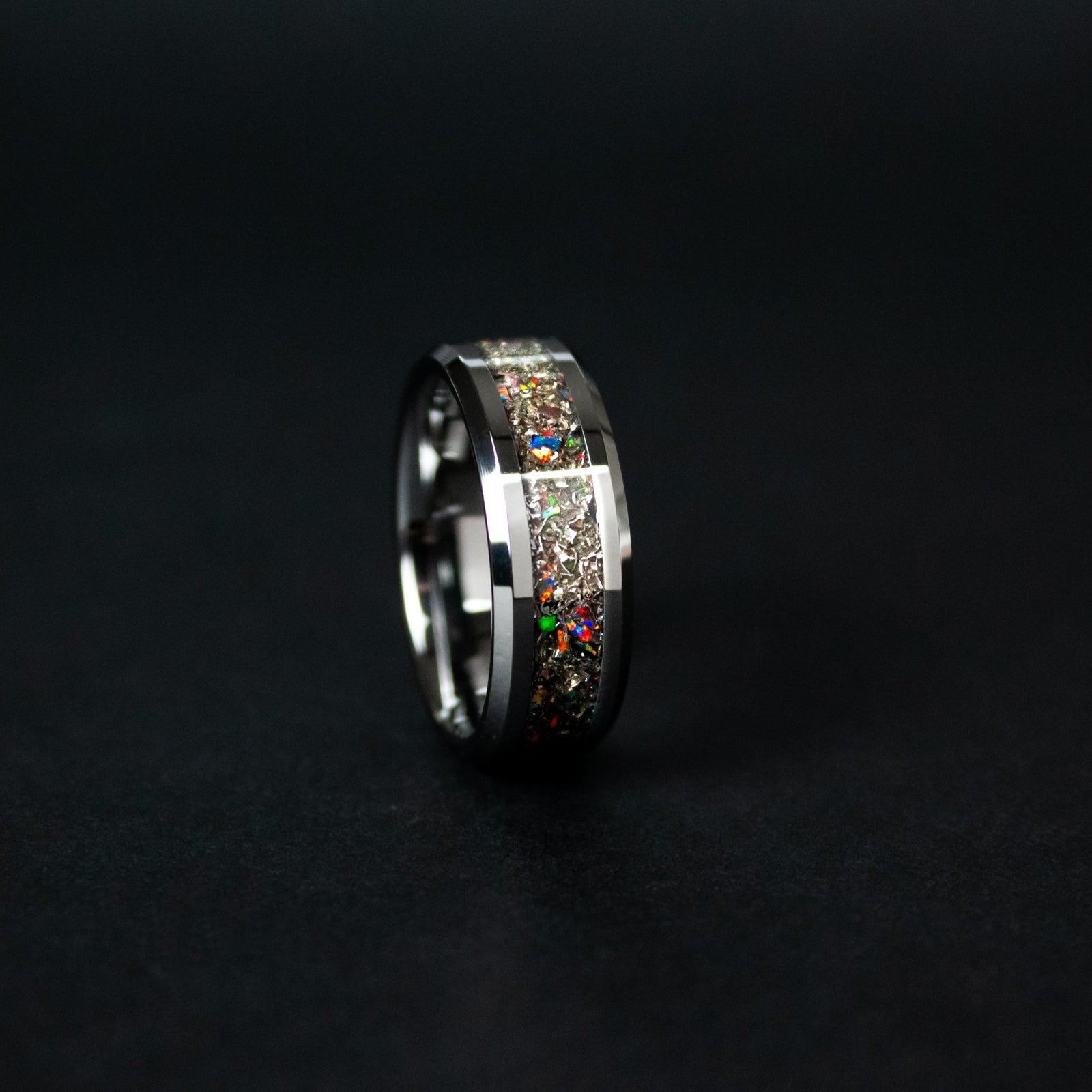 Handcrafted 8mm beveled tungsten mens wedding band with authentic Campo del Cielo meteorite and black fire opal accents made in California