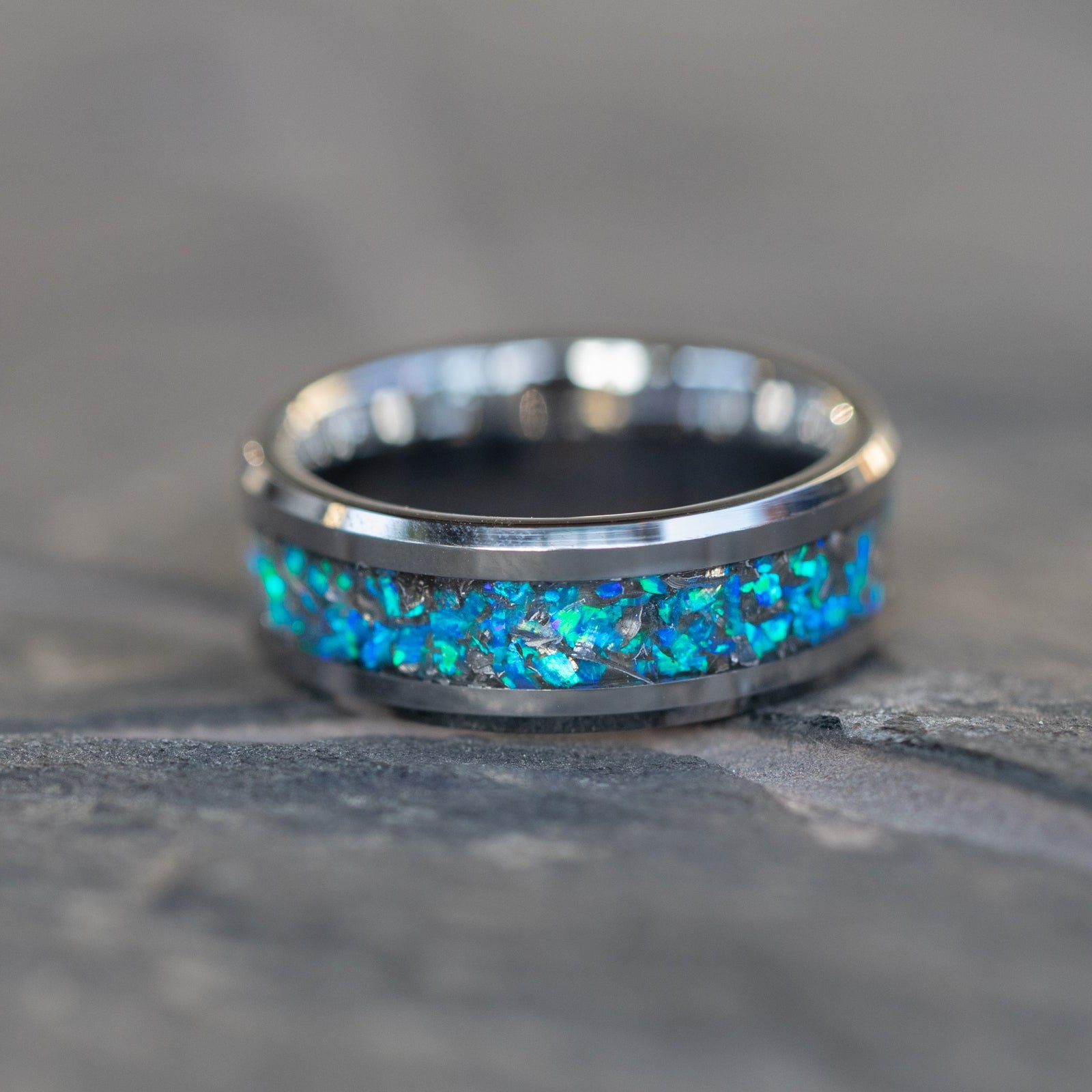 Handcrafted 8mm beveled tungsten mens wedding band with authentic Campo del Cielo meteorite in blue opal inlay made in California