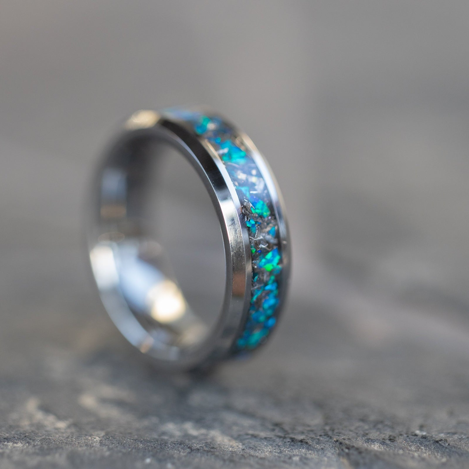 Handcrafted 6mm beveled tungsten mens wedding band with authentic Campo del Cielo meteorite in blue opal inlay made in California