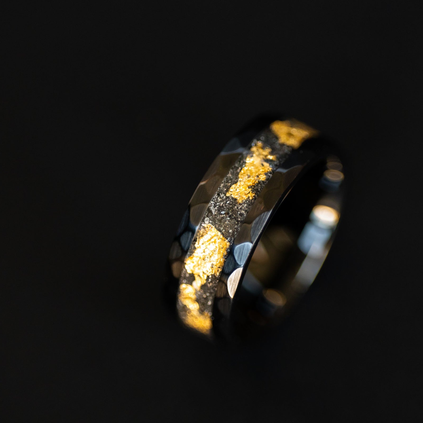 Handcrafted hammered black ceramic mens wedding band with authentic Campo del Cielo meteorite and real gold leaf inlay made in California