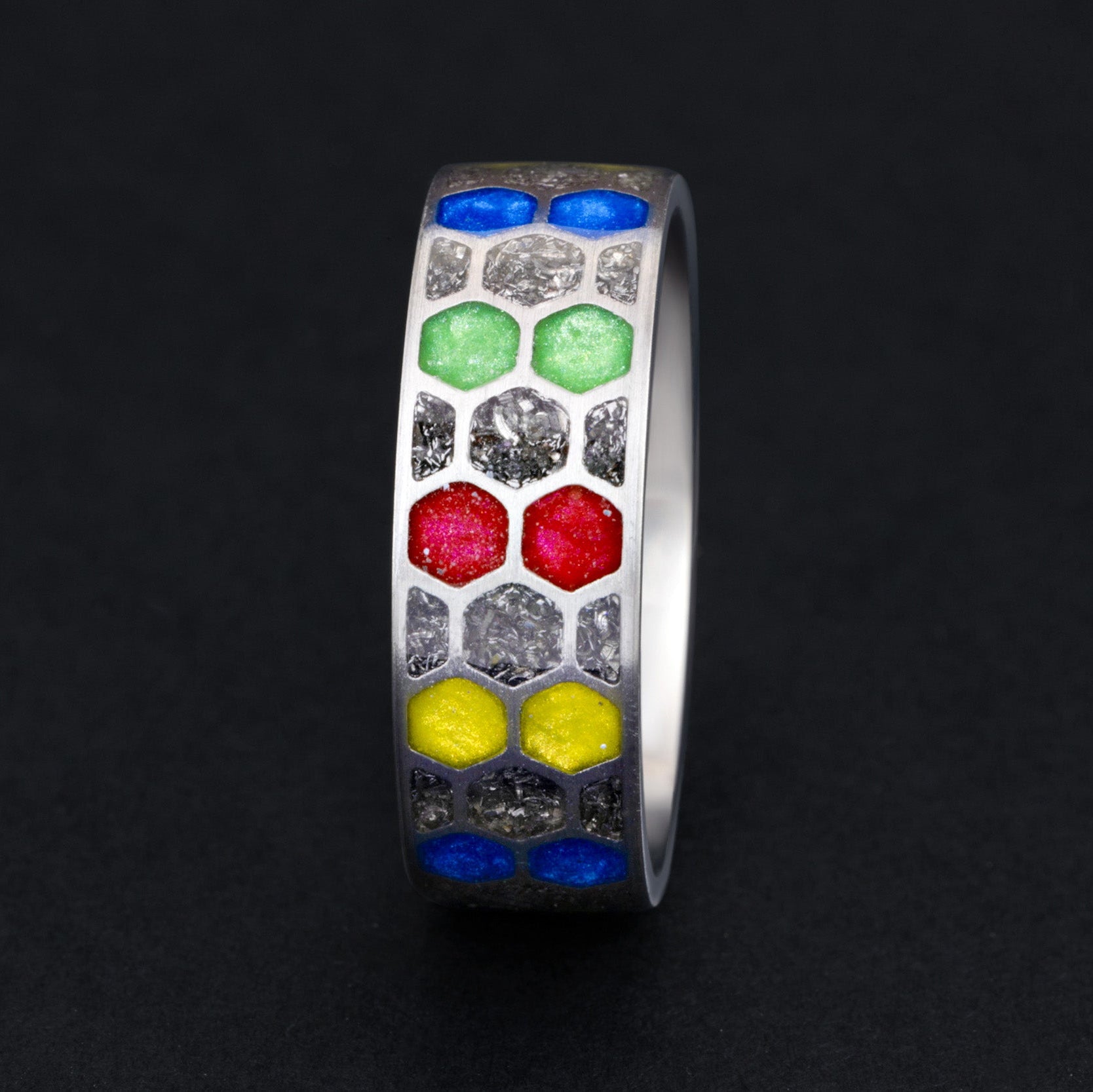 Handcrafted titanium honeycomb mens wedding band with authentic Campo del Cielo meteorite dust and multi-color resin cells made in California