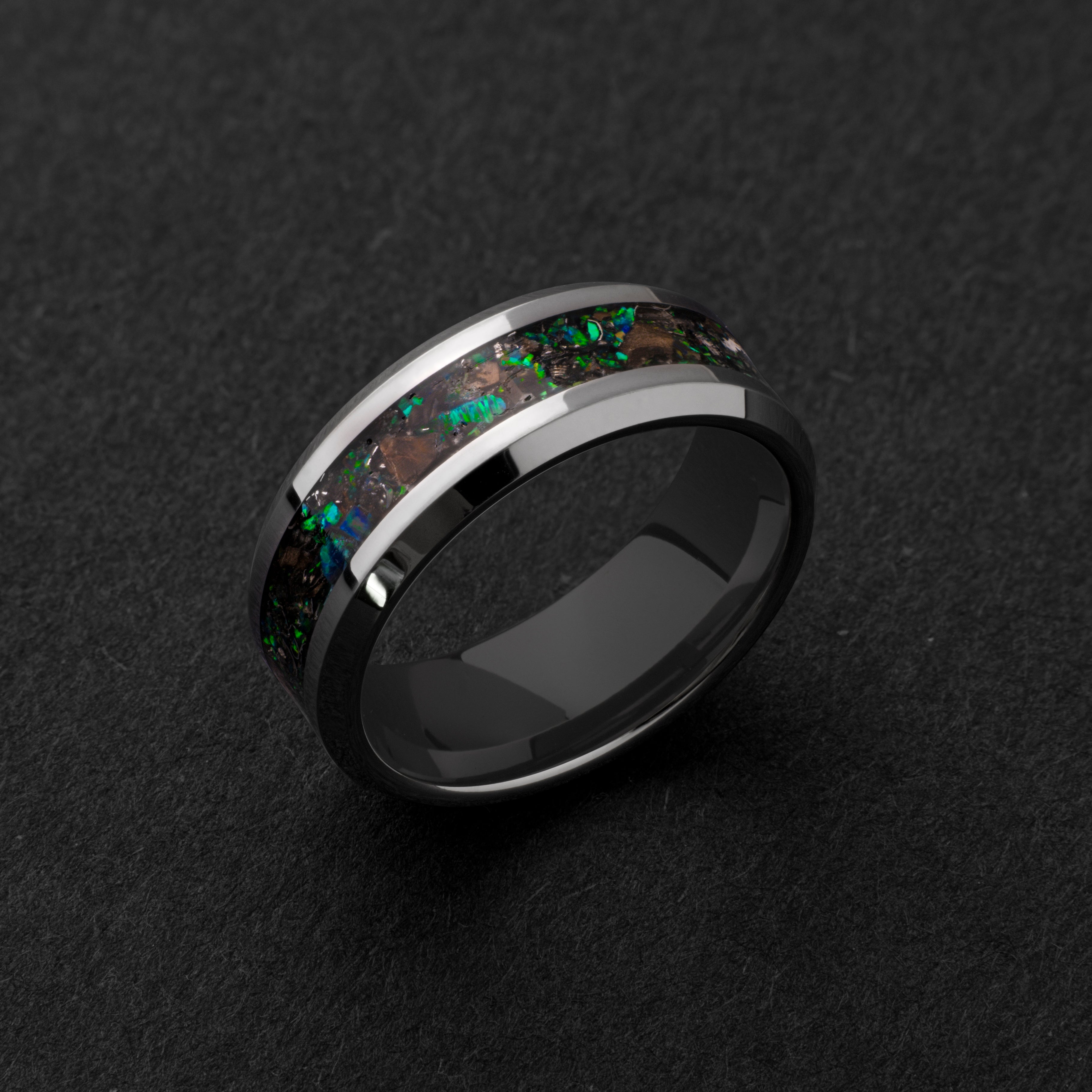 Handcrafted 8mm beveled tungsten mens wedding band with authentic T-Rex bone and Campo del Cielo meteorite in green opal inlay made in California