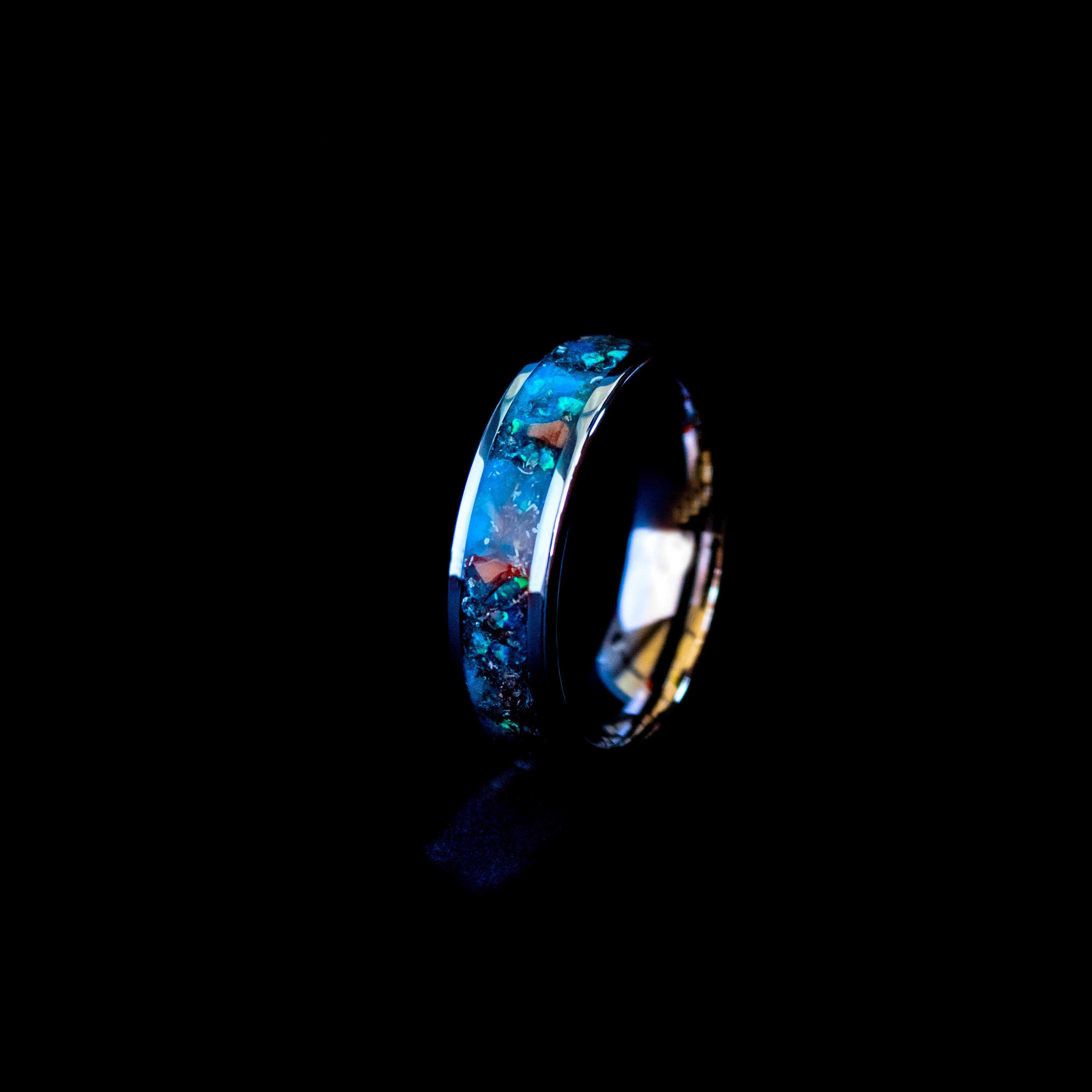 Handcrafted 6mm beveled tungsten mens wedding band with authentic Triceratops bone and Campo del Cielo meteorite in blue opal blue glow inlay made in California
