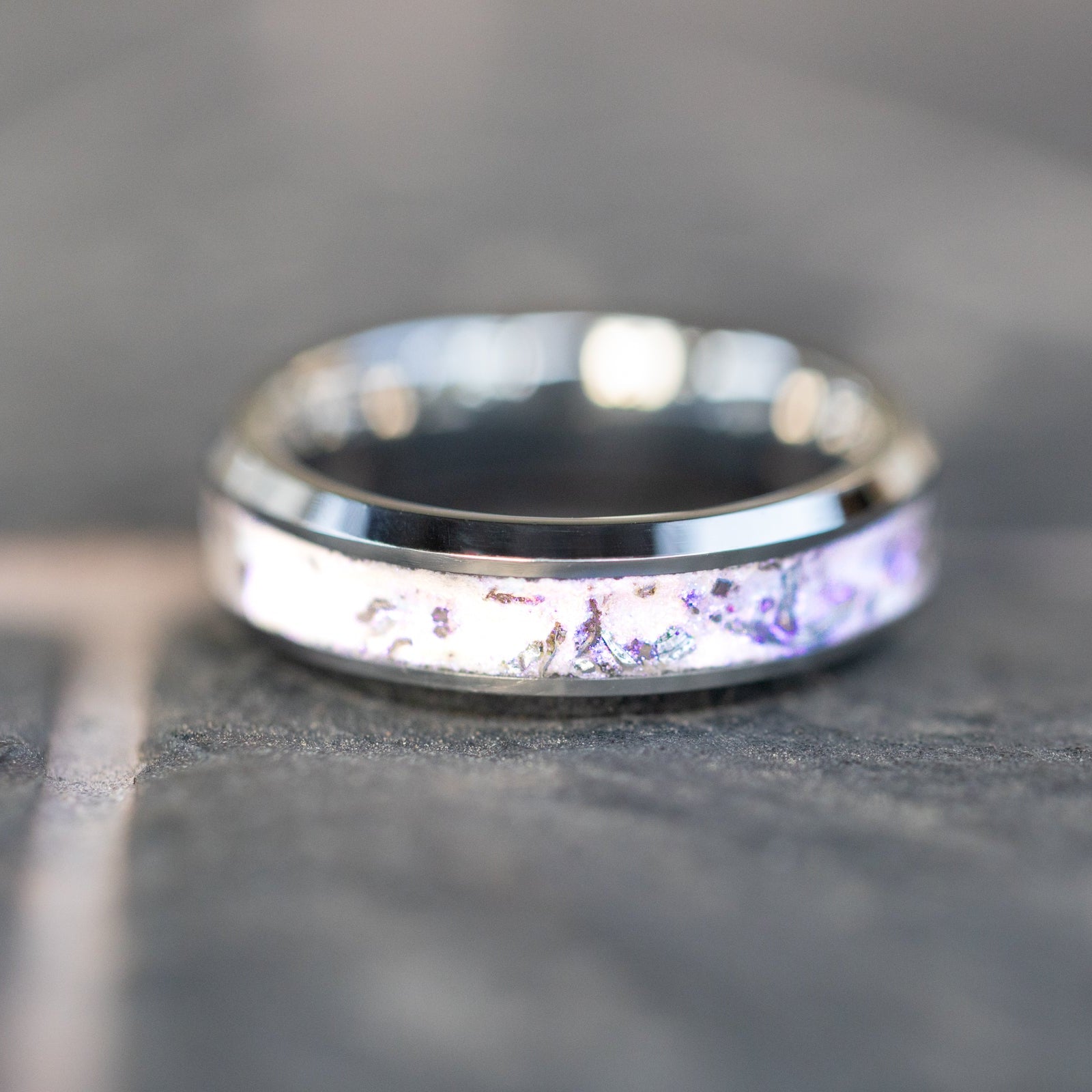 Handcrafted 6mm beveled tungsten mens wedding band with authentic Campo del Cielo meteorite in white pearl glitter inlay made in California