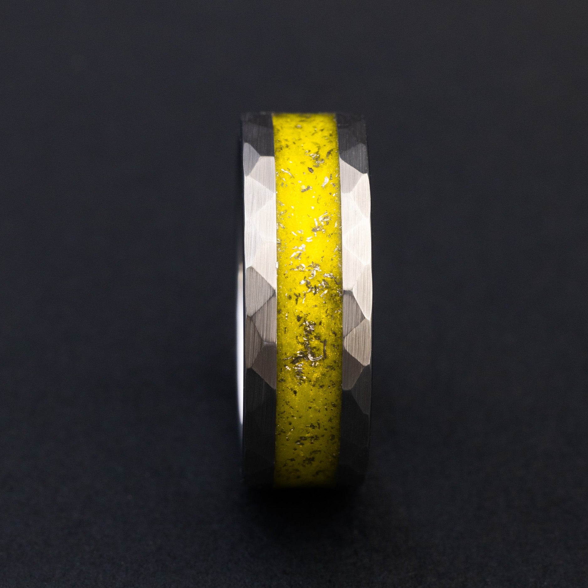 Handcrafted hammered tungsten wedding band featuring celestial Gibeon fragments and yellow inlay.